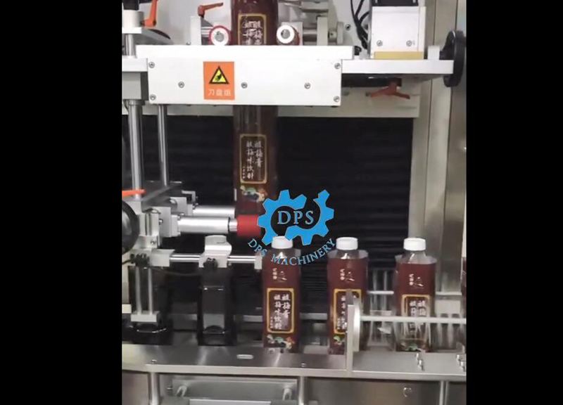 Square bottle shrink sleeve machine